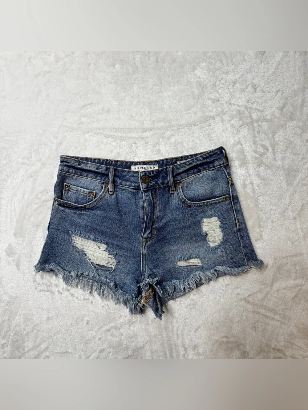 BullHead denim Co. Women's Distressed Blue Denim cutoff  mid/high rise Shorts.